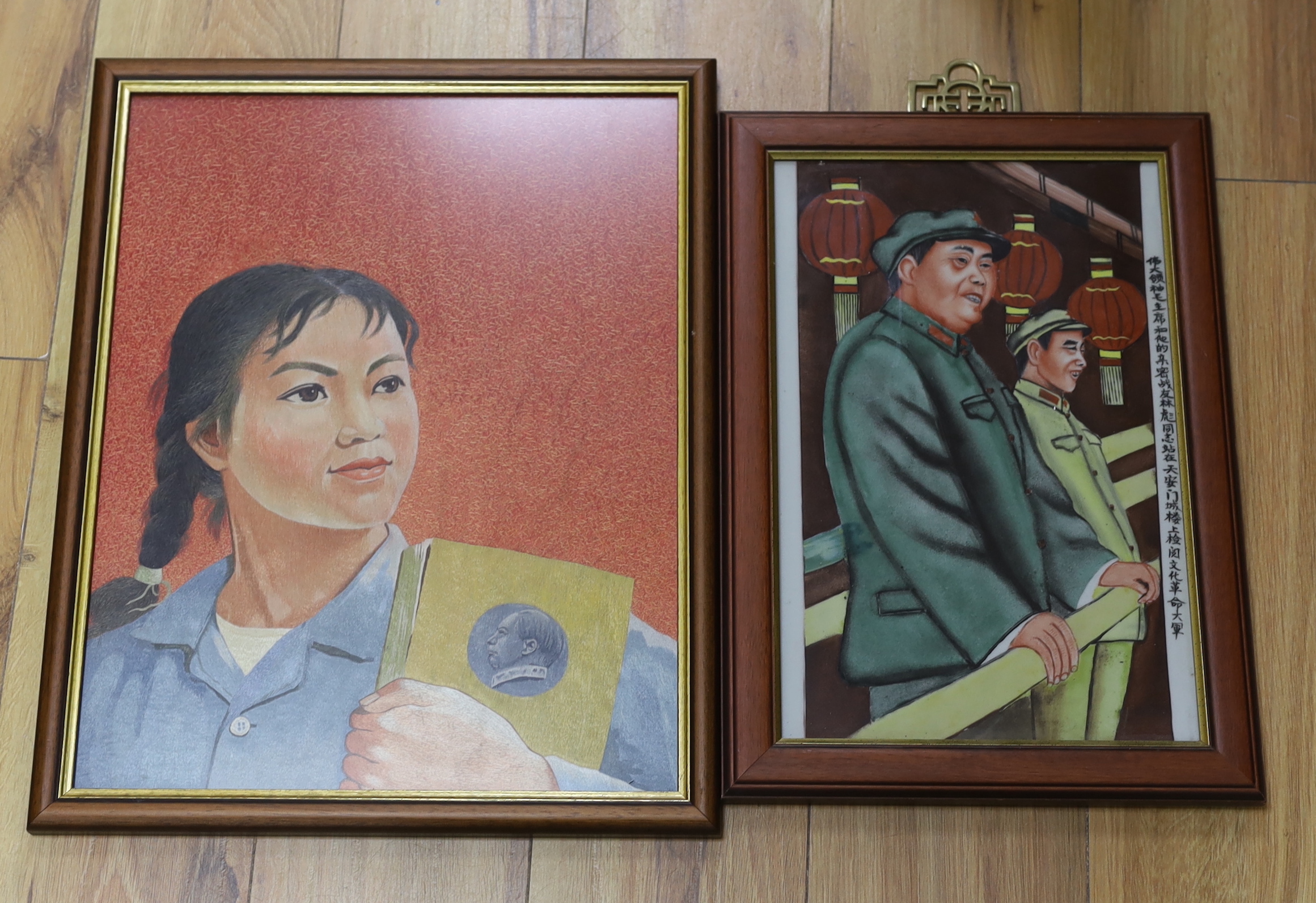 A framed Cultural Revolution embroidery picture of a girl holding a book and a porcelain tile of Mao, embroidery 34.5cm wide x 44.5cm high